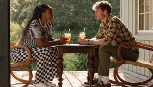 A couple discusses partner approval with Babytree Surrogacy, sharing a thoughtful iced tea conversation on their porch. babytree