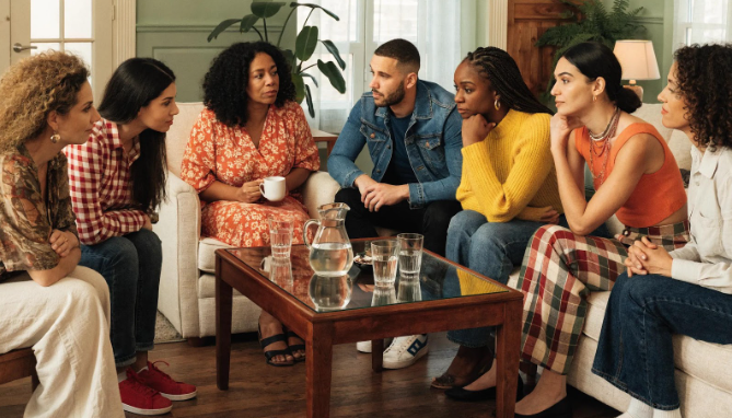 People meet for a thoughtful group talk at Babytree Surrogacy, showing care and support in a safe, welcoming setting. babytree
